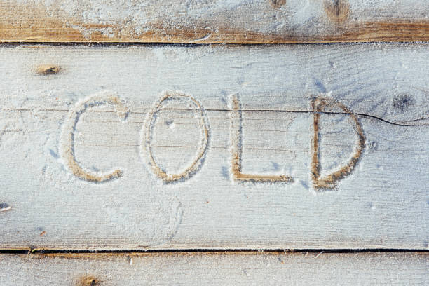 istock Writing on the snow. Wooden texture. 645325340