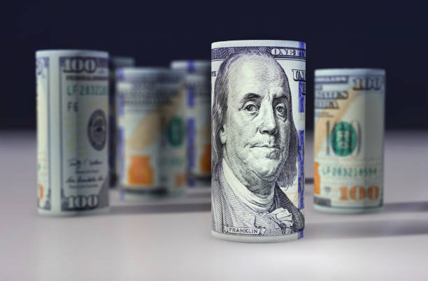 US dollars. Banknotes stacked on each other 100 US dollars. Banknotes stacked on each other in different positions. American dollar. US dollar the franklin institute stock pictures, royalty-free photos & images