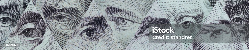 Portraits. Eyes well-known leader in the notes Portraits. Eyes well-known leader in the notes, the currency most dominant country in the world US dollar. Backgrounds Stock Photo