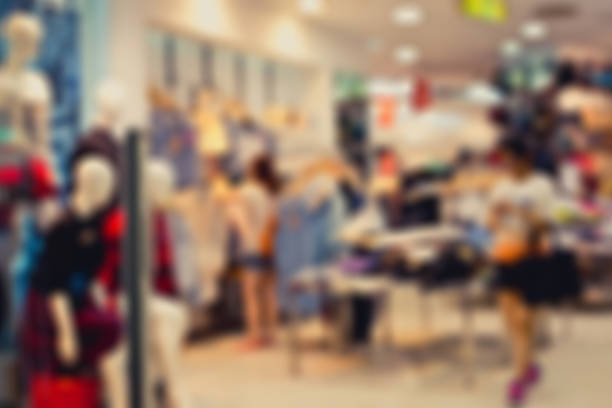istock Blur image of a dress store with customers. 645350616