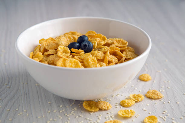istock granola with blueberries in white bowl on wooden 645350660