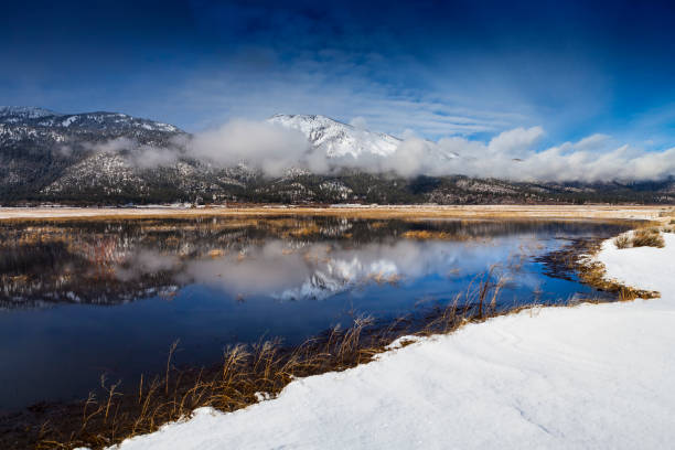 istock Washoe Valley, Nevada. Pond reflection and slide mountain in winter with snow. 645357212