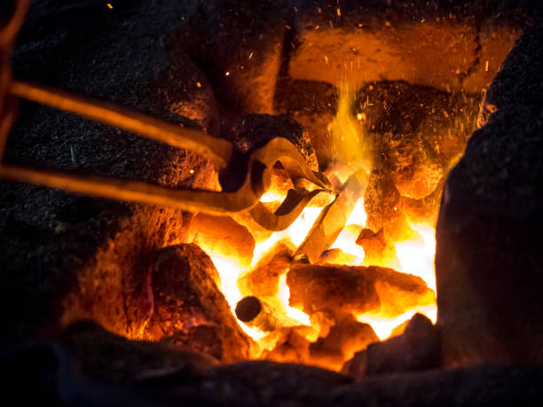 istock Blazing furnace at the blacksmith's 645360894