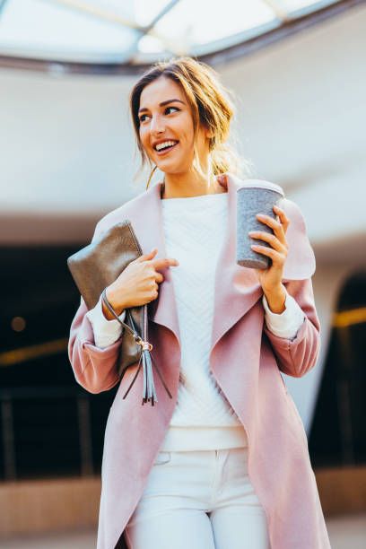 istock Beautiful elegant woman drinking coffee 645363378