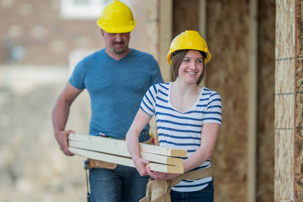 istock Father and Daughter Working Together 645363408