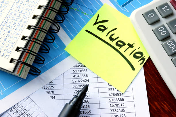 istock Valuation written on a sticker and financial data. 645364332