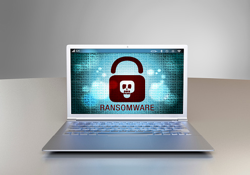 Ransomware at a computer screen laptop