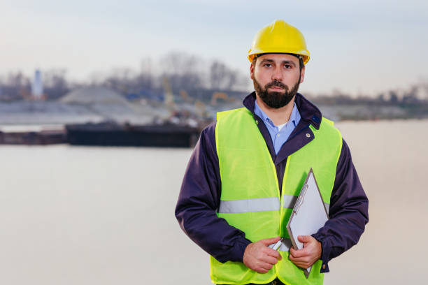 istock Working in freight transportation industry - engineer at the dock 645373630