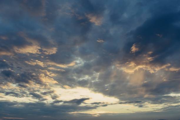 istock Dark cloud formations on blue sky in the evening before sunset,The bull 645373910