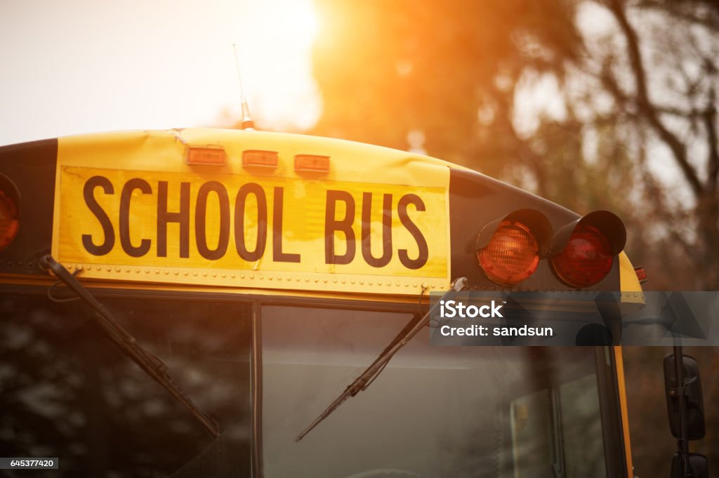 School bus School bus close up at sunset School Bus Stock Photo