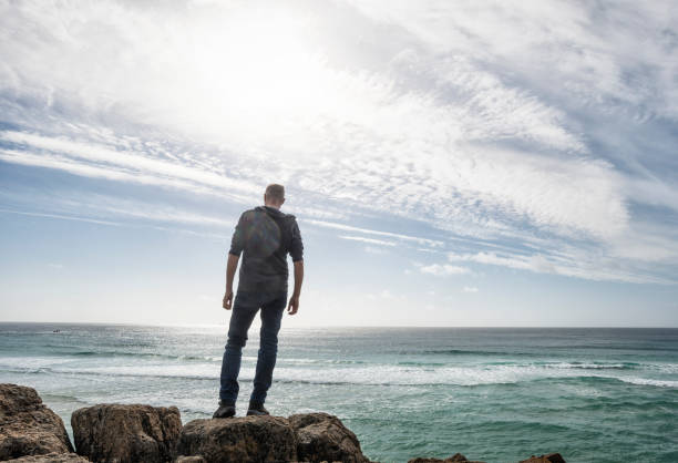 istock Man stood enjoying the view over the south Cornish Coast. 645377860