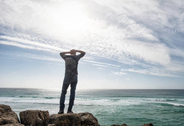 istock Man stood enjoying the view over the south Cornish Coast. 645377874