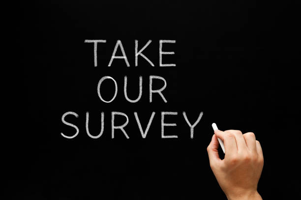 istock Take Our Survey Handwritten On Chalkboard 645378192