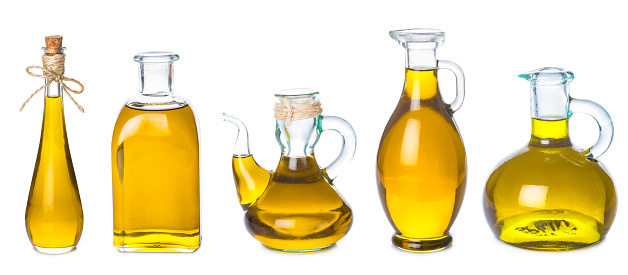 Set of extra virgin olive oil jars isolated on a white background