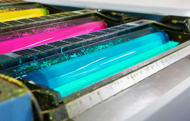 istock Detail of rollers in offset printing machine 645386806