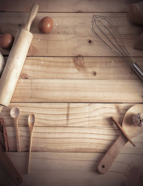 istock Blank wooden table background and bakery ingredients with copy space 645393494