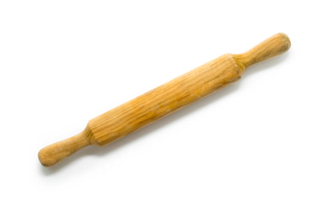 istock Wooden rolling pin on white background 645394316