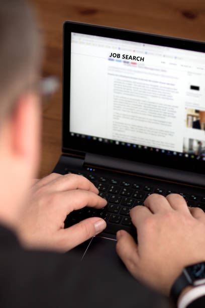 istock Business man searching for a job 645397336