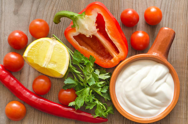 istock Vegetables and sour cream, ingredients for cooking 645397714