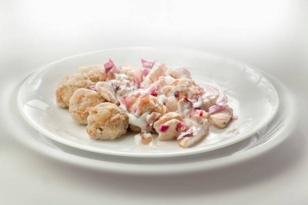 istock dumplings in bechamel onion sauce 645411748