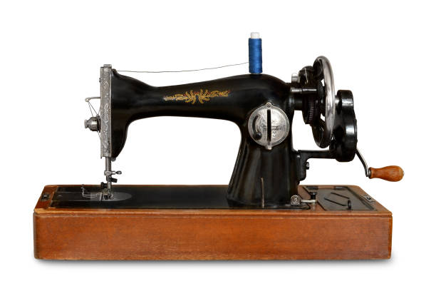 istock old sewing machine with manual drive on white isolated background 645414966