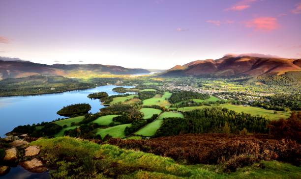Pink morning skies over Keswick Pink morning skies over Skiddaw keswick stock pictures, royalty-free photos & images