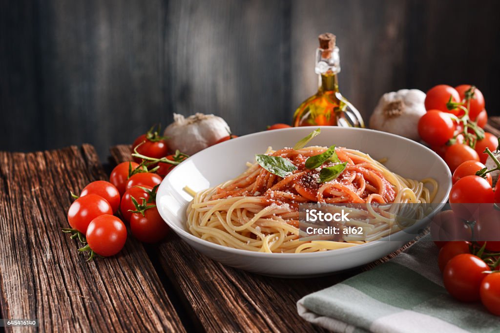 spaghetti with tomato sauce with parmesan cheese and basil spaghetti with tomato sauce with parmesan cheese and basil - Italian food Italian Food Stock Photo