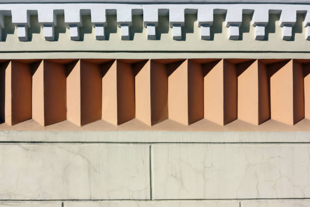 istock Fragment of a standard pattern in antique style on a city wall 645418984