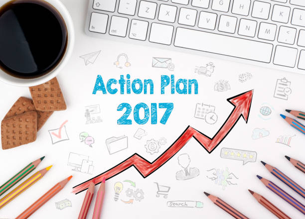 istock Action Plan 2017, Business concept. White office desk 645421892