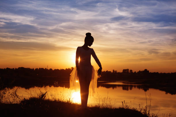 Silhouette of a Ballet Dancer at Sunset Outdoors