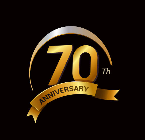 istock 70 years golden anniversary logo celebration with ring and ribbon. 645454450