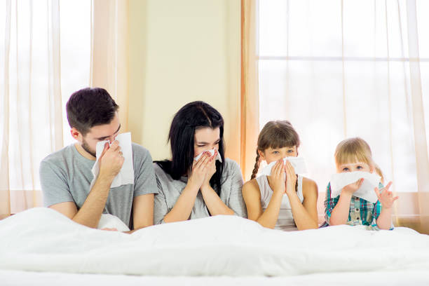 istock the family is sick in bed 645455014