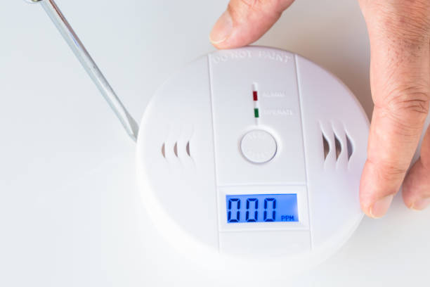 istock Installation of a smoke and fire alarm with carbon monoxide sensor capability 645462772