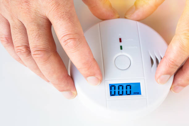 istock Installation of a smoke and fire alarm with carbon monoxide sensor capability 645462774