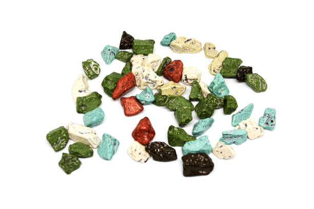 close up chocolate pebbles on white background