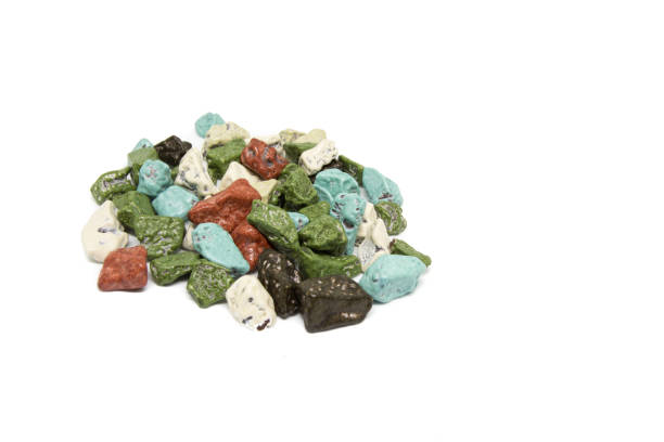 istock close up chocolate pebbles on white background 645472110