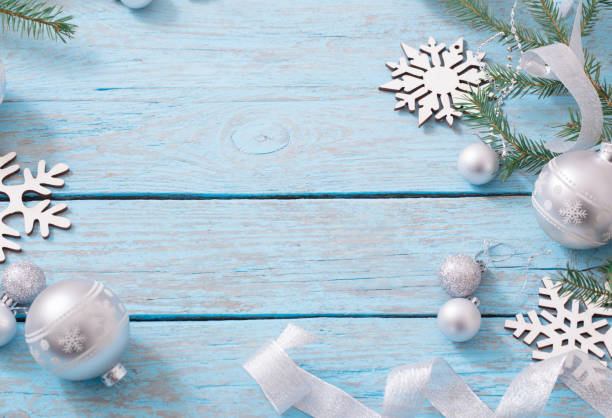 istock Christmas decoration on blue wooden background 645474964