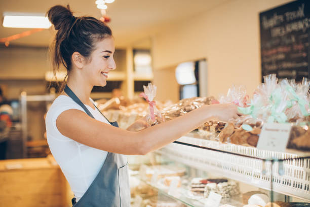 istock Arranging cookies in the bakery 645475384