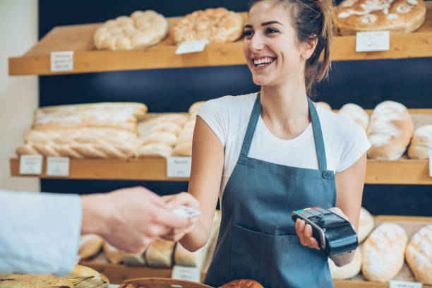 istock Paying with a credit card in the bakery 645475392