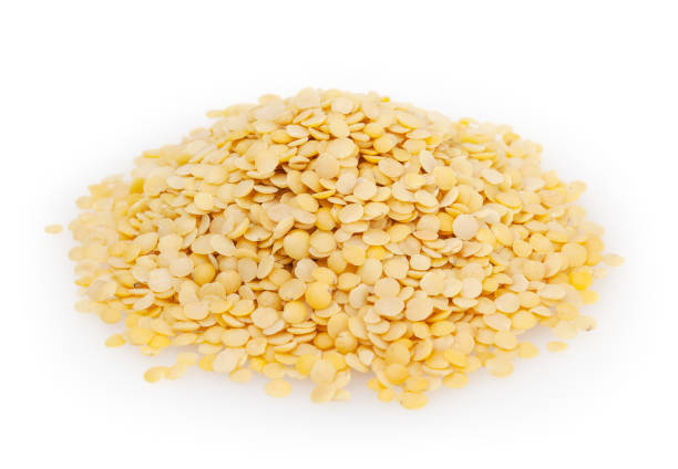 istock Yellow lentils isolated on white background with clipping path 645478268