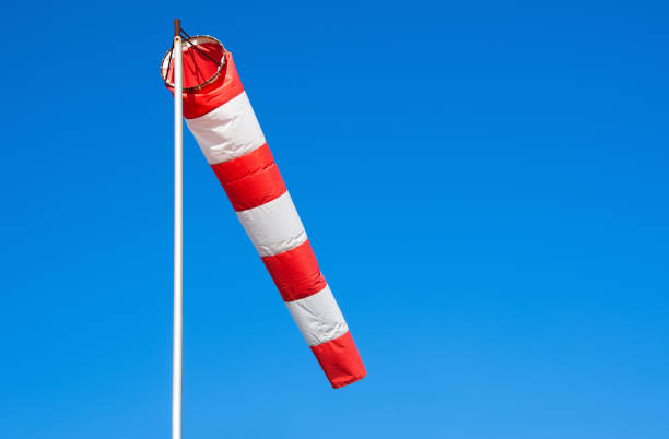 istock Airport windsock on clear blue sky background.  Air sock. 645487194
