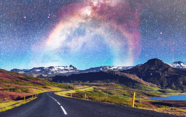 istock Fantastic starry sky and the milky way. Bridge over a channel c 645488032