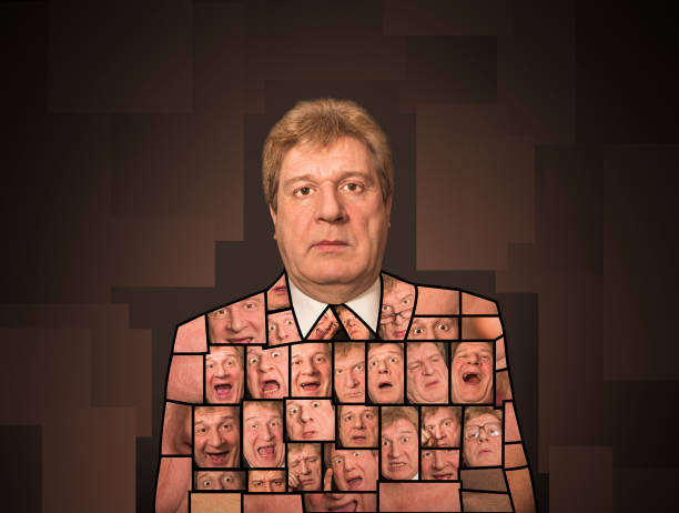 Portrait of successful business man peeping from behind blue curtain