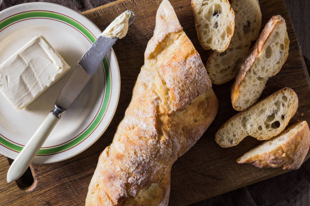 istock French baguette with butter for breakfast 645494856