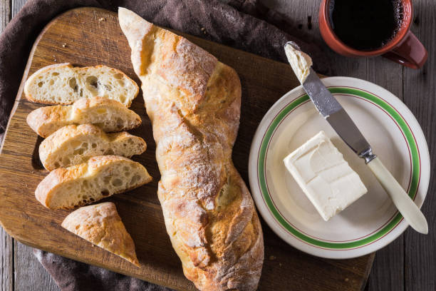 istock French baguette with butter for breakfast 645495114