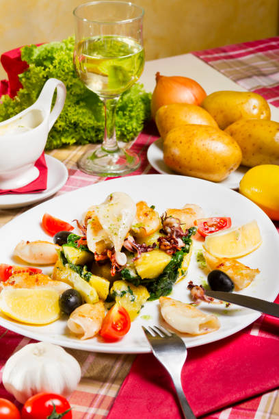 istock Grilled Calamari Side Dish and White Wine 645496498