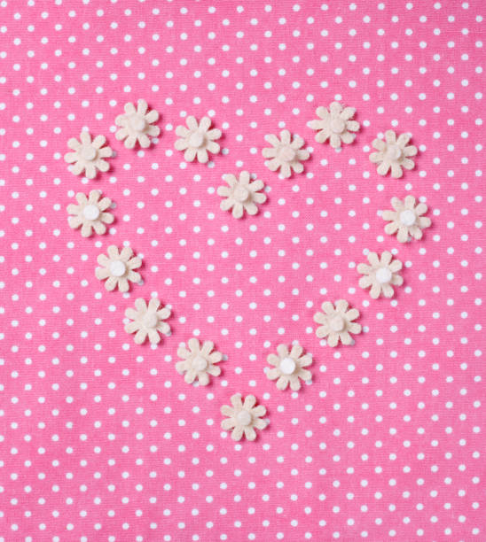 White flowers on pink background