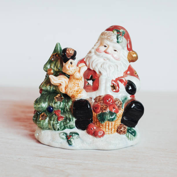 Santa Claus with gift - toy - isolated on white background.