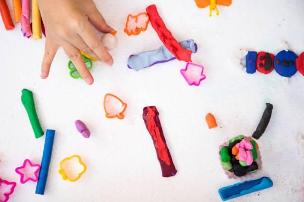 istock play colorful dough with vary shape of mold, enhance imagination 645501838
