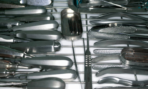 istock Oral surgery instruments in the sterilizer background 645521338